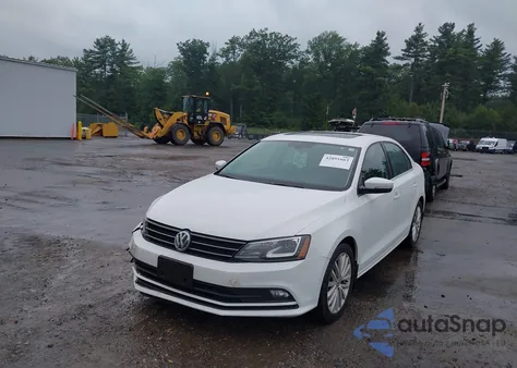 2016 Volkswagen Jetta 1.8T Sel z USA, uszkodzony, nr VIN 3VWL17AJ8GM395429